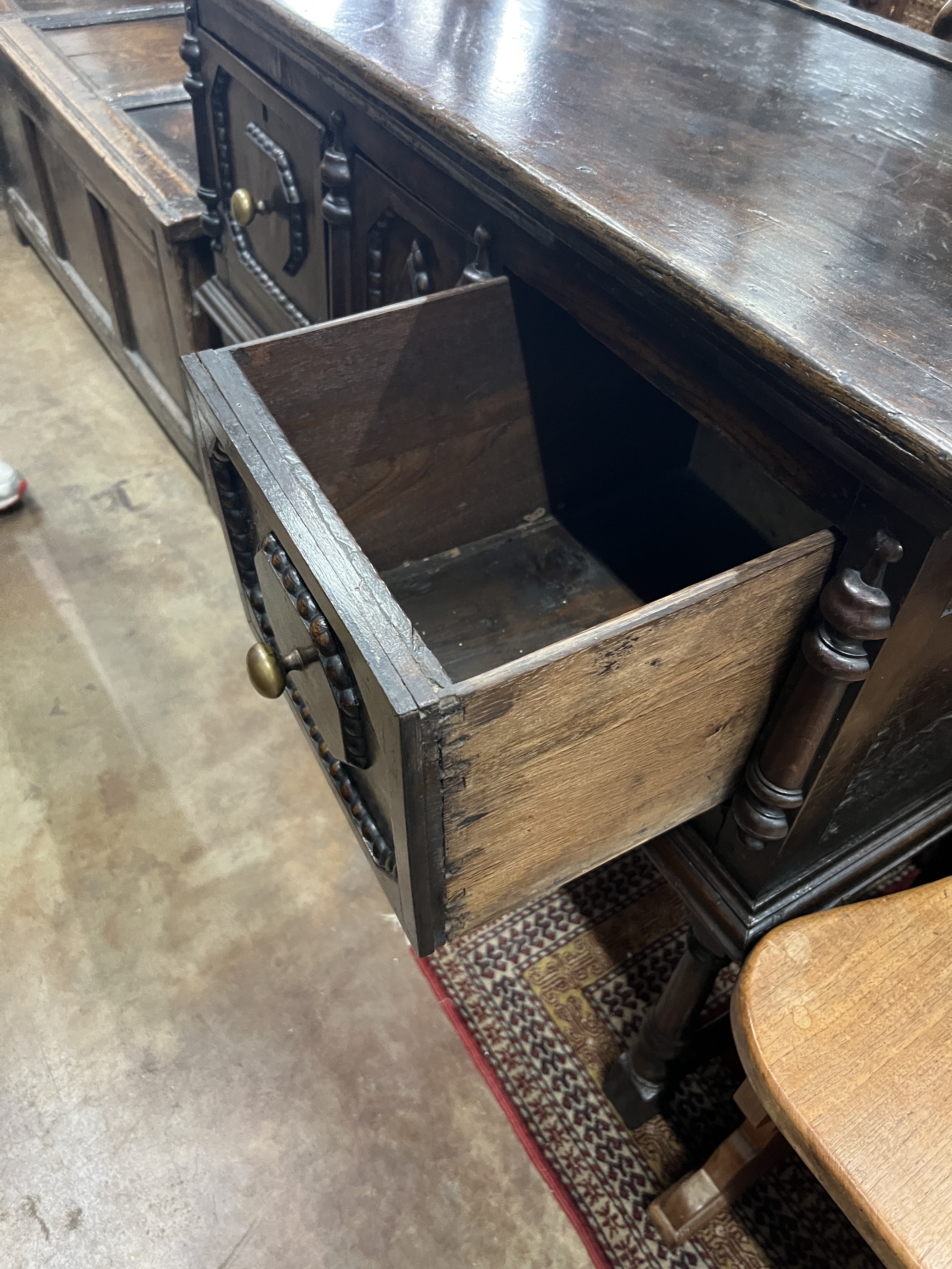 An 18th century style small oak three drawer low dresser, width 98cm, depth 46cm, height 79cm